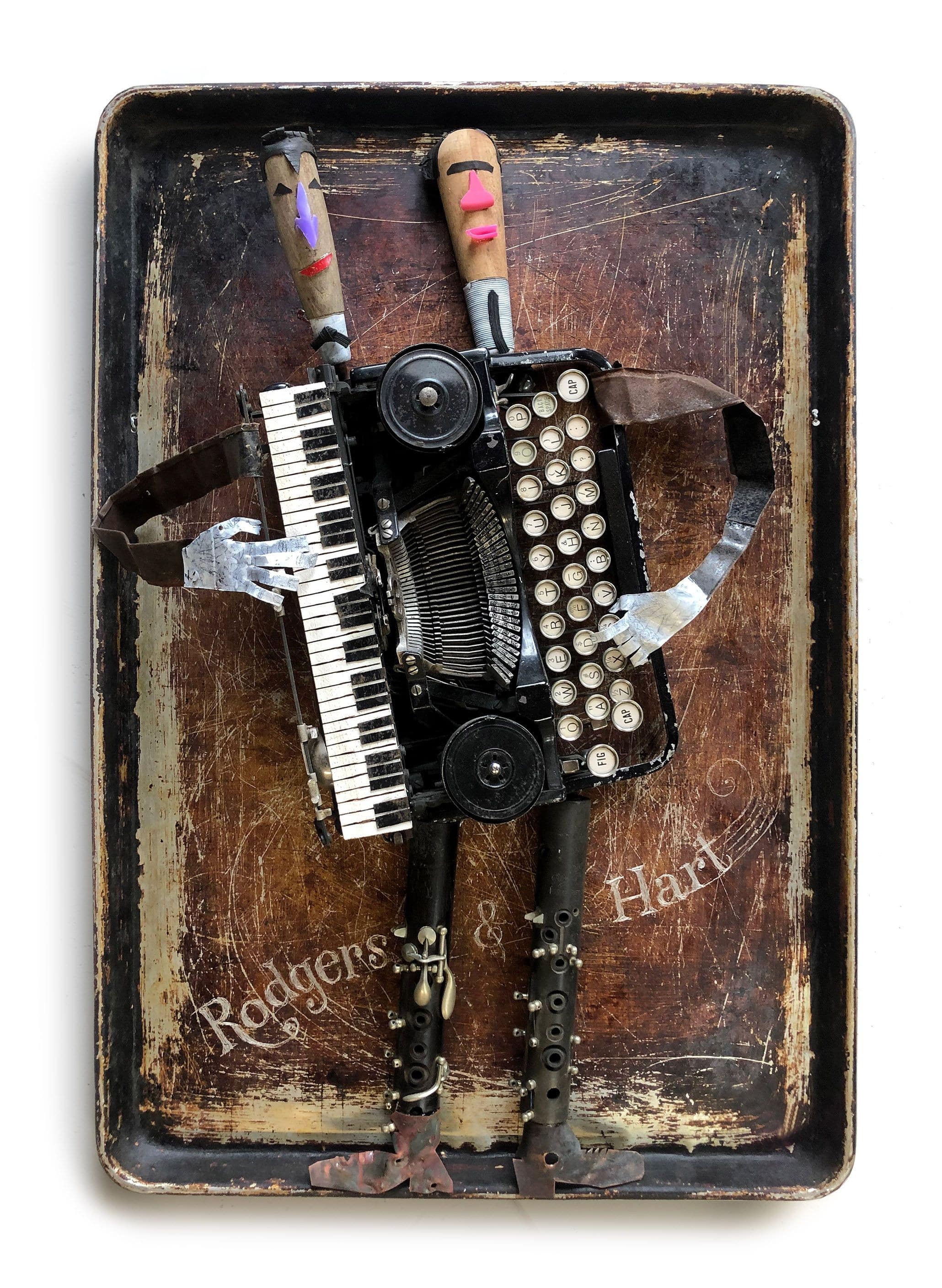 18x26" assemblage made of antique typewriter, clarinet and other found objects